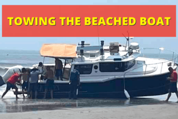 Towing The Beached N. Wildwood Boat Back To Sea (Video)