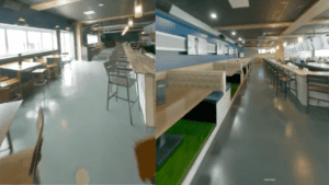 A modern cafeteria with high stools and wooden tables.