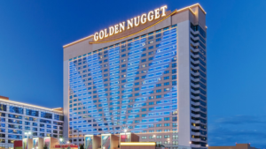 Golden Nugget hotel building lit up at night.