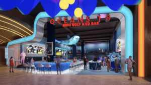 Interior view of Ocean's 8 Mini Golf and Bar with people playing and socializing.